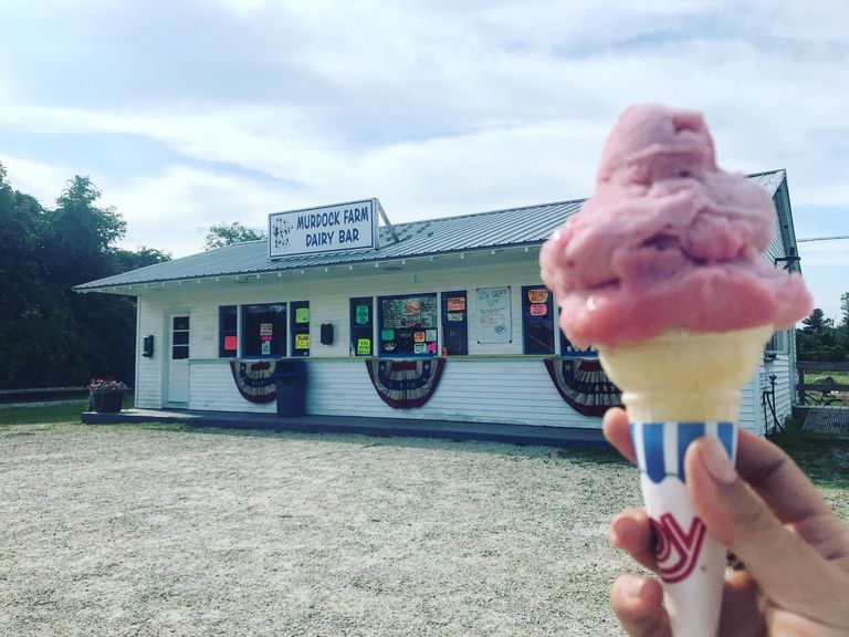 Ice Cream Cone with Murdock Farm & Dairy Bar in background