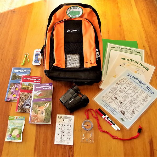 Nature Adventure Backpacks contain binoculars, a compass, field guides, and interactive worksheets