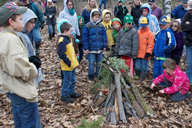 Winchendon Scouts touring the fairy houses they built