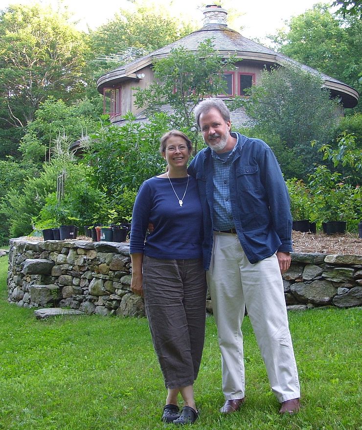 Dan Leahy & Julia Rabin in front of their home